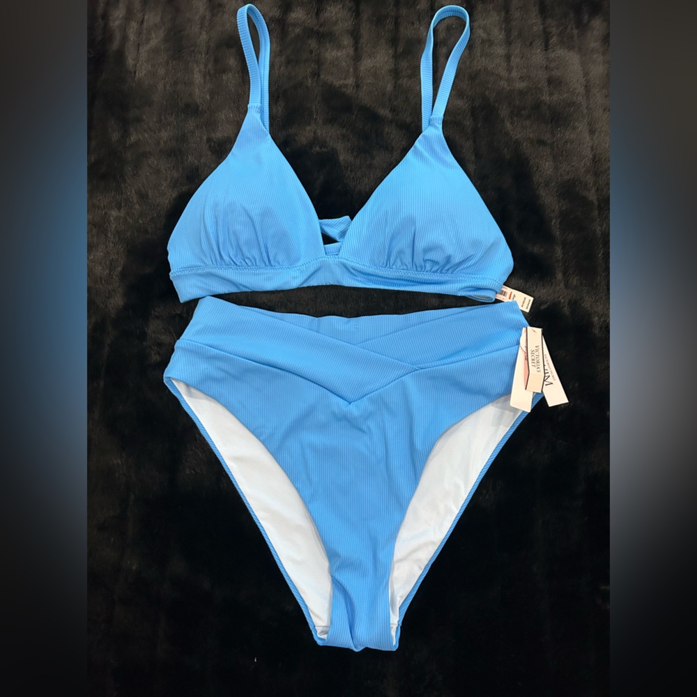 NWT Victoria's Secret Blue Bikini. Size large. Hi waist cheeky bottom. Tie top.